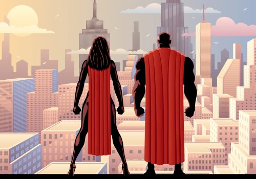Superhero,Couple,Watching,Over,The,City,During,The,Day.